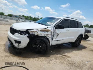 2019 Jeep Grand Cherokee Laredo E with VIN 1C4RJFAG4KC590207, listed as a Copart auction lot 61689305 with 101,039 mi miles and Salvage title. Bid and sale history available at DreamBid. Image 1.