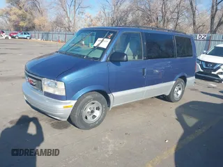 1996 GMC Safari with VIN 1GKEL19W0TB518584, listed as a IAAI auction lot 40995319 with 174,397 mi miles and . Bid and sale history available at carsss.com. Image 2.
