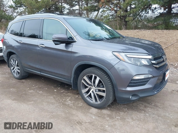 2017 Honda Pilot Touring with VIN 5FNYF6H92HB012090, listed as a IAAI auction lot 41882542 with 110,179 mi miles and . Bid and sale history available at DreamBid. Image 1.