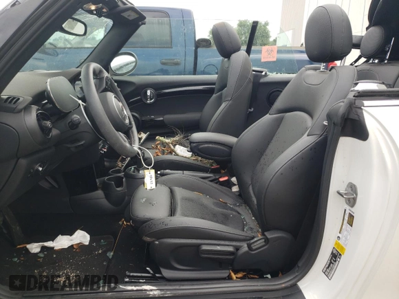 2023 MINI Convertible Cooper S z VIN WMW43DL01P3R28109, wystawiony jako Copart lot #58678604 z przebiegiem 3 682 mil mil oraz Szkoda całkowita • Salvage title. Historia ofert i sprzedaży dostępna na DreamBid. Obrazek 7.