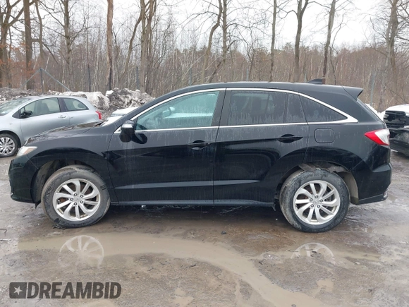 2016 Acura RDX with VIN 5J8TB4H38GL015305, listed as a IAAI auction lot 41672385 with 121,623 mi miles. Bid and sale history available at carsss.com. Image 14.