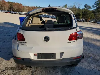 2014 Volkswagen Tiguan SE z VIN WVGAV3AX1EW523157, wystawiony jako Copart lot #82111894 z przebiegiem 103 172 mil mil oraz Szkoda całkowita • Salvage title. Historia ofert i sprzedaży dostępna na DreamBid. Obrazek 6.