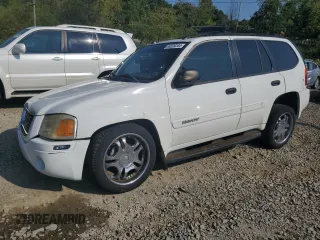 2005 GMC Envoy SLT with VIN 1GKDT13S552329269, listed as a Copart auction lot 69209244 with 154,595 mi miles and Salvage Title. Bid and sale history available at carsss.com. Image 1.