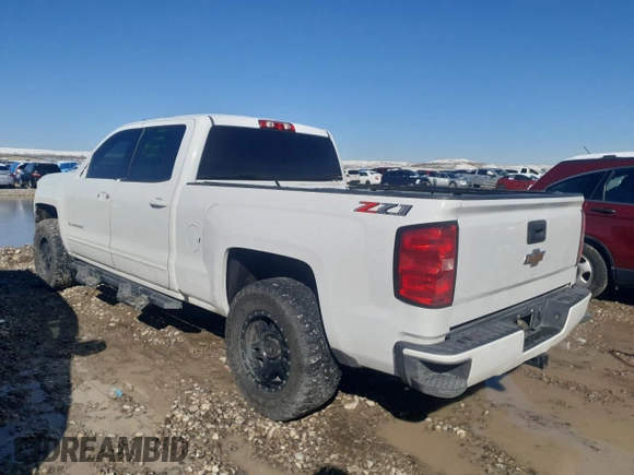 2018 Chevrolet Silverado 1500 LT with VIN 1GCUKRECXJF198247, listed as a Copart auction lot 49496595 with 81,408 mi miles and Salvage Title. Bid and sale history available at DreamBid. Image 2.