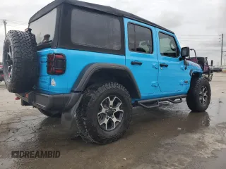 2021 Jeep Wrangler Unlimited Rubicon with VIN 1C4JJXFM4MW617635, listed as a Copart auction lot 58956205 with 52,995 mi miles and Salvage title. Bid and sale history available at DreamBid. Image 3.