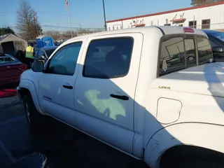 2010 Toyota Tacoma PreRunner with VIN 3TMJU4GN4AM100621, listed as a IAAI auction lot 41786994 with 222,327 mi miles and . Bid and sale history available at DreamBid. Image 14.