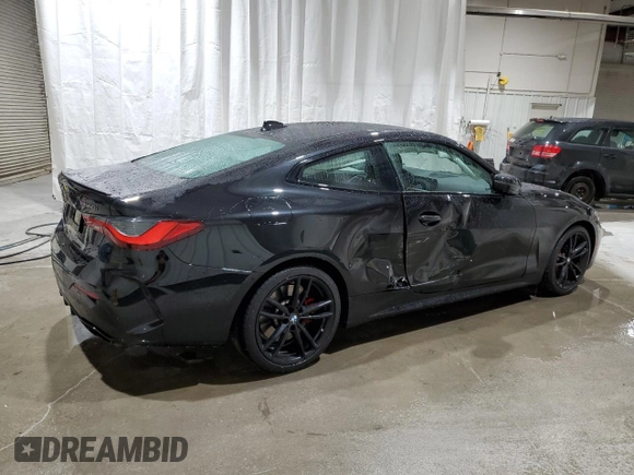 2021 BMW 4 Series M440i xDrive with VIN WBA13AR0XMCG68638, listed as a Copart auction lot 52142695 with 57,299 mi miles and Salvage Title. Bid and sale history available at DreamBid. Image 3.