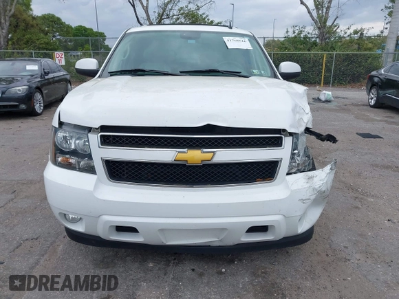 2014 Chevrolet Suburban LT with VIN 1GNSCJE06ER231476, listed as a IAAI auction lot 41768616 with 88,581 mi miles. Bid and sale history available at carsss.com. Image 6.