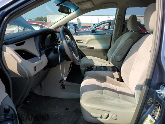 2016 Toyota Sienna LE with VIN 5TDJK3DC2GS133323, listed as a Copart auction lot 70515664 with 106,750 mi miles and Salvage Title. Bid and sale history available at carsss.com. Image 7.