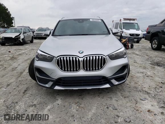 2020 BMW X1 xDrive28i with VIN WBXJG9C05L5P76067, listed as a Copart auction lot 40635893 with 57,184 mi miles. Bid and sale history available at carsss.com. Image 5.
