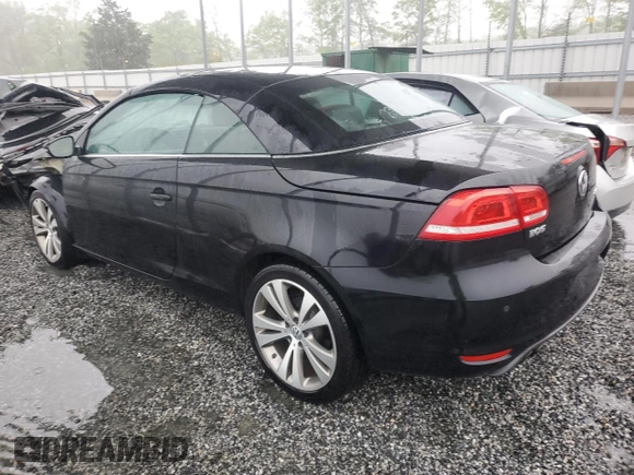 2013 Volkswagen Eos Lux with VIN WVWFW8AH3DV005858, listed as a Copart auction lot 51748545 with 76,624 mi miles and Salvage Title. Bid and sale history available at DreamBid. Image 2.