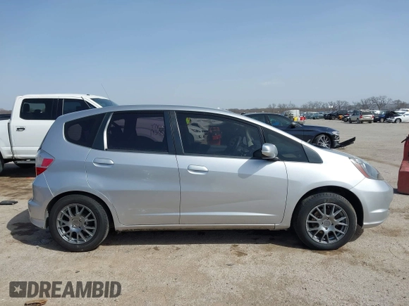 2013 Honda Fit with VIN JHMGE8H31DC036859, listed as a IAAI auction lot 41740431 with 112,466 mi miles. Bid and sale history available at carsss.com. Image 13.