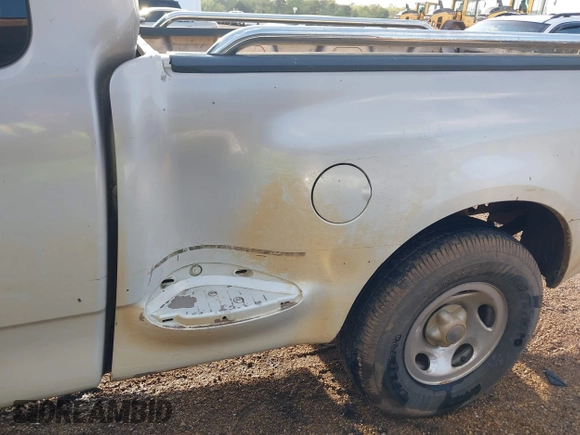 1998 Ford F-150 XL with VIN 1FTRX07L1WKA76665, listed as a IAAI auction lot 41863626 with 30,654 mi miles. Bid and sale history available at carsss.com. Image 11.