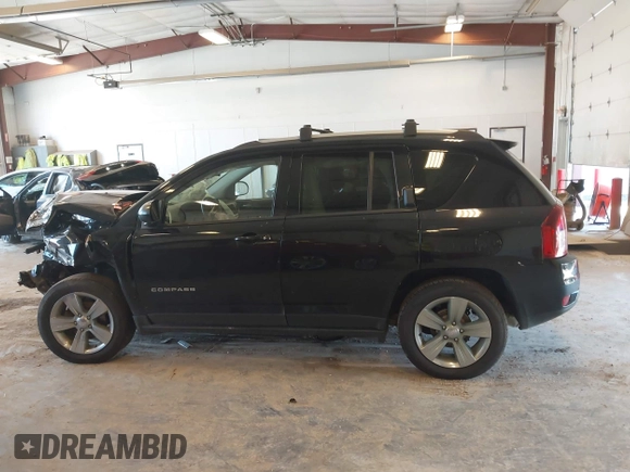 2016 Jeep Compass Sport z VIN 1C4NJCBA7GD621393, wystawiony jako IAAI lot #42640609 z przebiegiem 130 885 mil mil oraz . Historia ofert i sprzedaży dostępna na DreamBid. Obrazek 14.