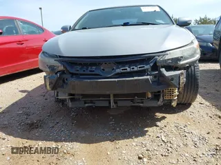 2014 Scion tC with VIN JTKJF5C78E3075164, listed as a IAAI auction lot 41922609 with 142,064 mi miles. Bid and sale history available at carsss.com. Image 6.