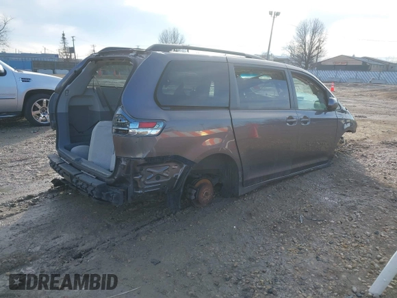 2012 Toyota Sienna SE with VIN 5TDXK3DC5CS264461, listed as a IAAI auction lot 41526874 with 1 mi miles. Bid and sale history available at carsss.com. Image 4.