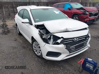 2021 Hyundai Accent SE z VIN 3KPC24A63ME152837, wystawiony jako IAAI lot #42158383 z przebiegiem 13 337 mil mil oraz . Historia ofert i sprzedaży dostępna na DreamBid. Obrazek 1.