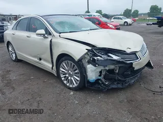 2015 Lincoln MKZ z VIN 3LN6L2JK9FR622100, wystawiony jako IAAI lot #42269664 z przebiegiem 52 287 mil mil oraz . Historia ofert i sprzedaży dostępna na DreamBid. Obrazek 1.