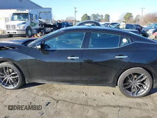 2016 Nissan Maxima SL z VIN 1N4AA6AP7GC395972, wystawiony jako IAAI lot #41357101 z przebiegiem 187 884 mil mil oraz . Historia ofert i sprzedaży dostępna na DreamBid. Obrazek 14.