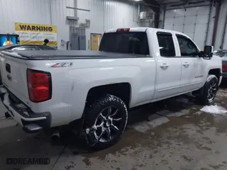 2015 Chevrolet Silverado 1500 LT with VIN 1GCVKREC1FZ225653, listed as a IAAI auction lot 41514814 with 133,468 mi miles. Bid and sale history available at carsss.com. Image 4.