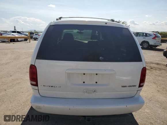 1998 Chrysler Town & Country LXi with VIN 1C4GP64L2WB637437, listed as a Copart auction lot 70504424 with 82,972 mi miles and Salvage Title. Bid and sale history available at carsss.com. Image 6.