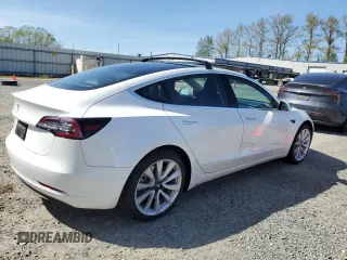 2019 Tesla Model 3 Mid Range with VIN 5YJ3E1EA0KF484178, listed as a Copart auction lot 53121915 with 64,929 mi miles and Salvage Title. Bid and sale history available at DreamBid. Image 3.