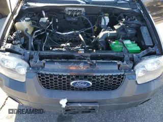 2007 Ford Escape XLS z VIN 1FMYU02Z77KA52643, wystawiony jako Copart lot #50971365 z przebiegiem 183 604 mil mil oraz Szkoda całkowita • Salvage title. Historia ofert i sprzedaży dostępna na DreamBid. Obrazek 12.
