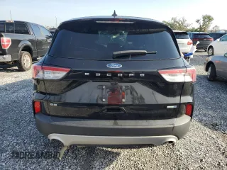 2020 Ford Escape SE z VIN 1FMCU9G60LUB71341, wystawiony jako Copart lot #64753865 z przebiegiem 138 490 mil mil oraz Czysty tytuł • Clean title. Historia ofert i sprzedaży dostępna na DreamBid. Obrazek 6.