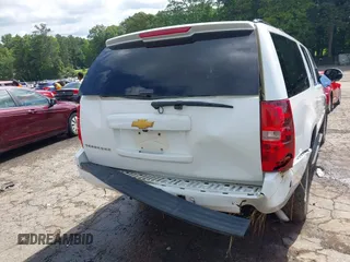 2014 Chevrolet Suburban LT with VIN 1GNSCJE07ER211222, listed as a IAAI auction lot 42428084 with 214,712 mi miles and . Bid and sale history available at DreamBid. Image 16.