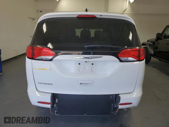 2021 Chrysler Voyager LXi with VIN 2C4RC1DG3MR545911, listed as a Copart auction lot 55113795 with 83,624 mi miles and Clean Title. Bid and sale history available at DreamBid. Image 6.