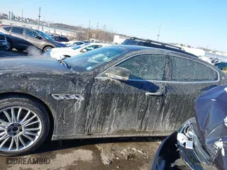 2014 Maserati Quattroporte S Q4 with VIN ZAM56RRA3E1123504, listed as a IAAI auction lot 41395299 with 49,192 mi miles. Bid and sale history available at carsss.com. Image 13.
