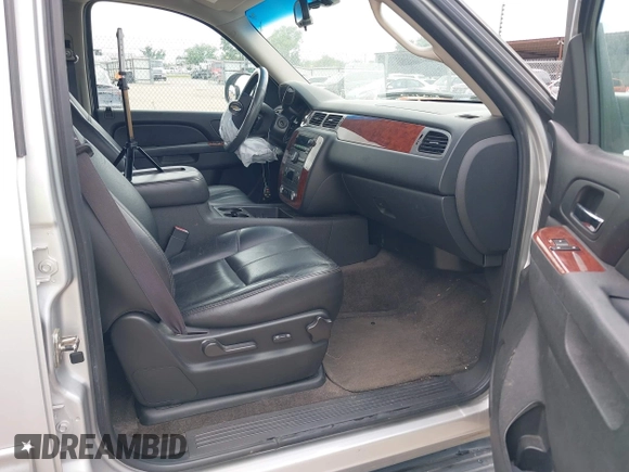 2011 Chevrolet Suburban LT with VIN 1GNSCJE05BR294452, listed as a IAAI auction lot 42107580 with 165,313 mi miles and . Bid and sale history available at DreamBid. Image 5.