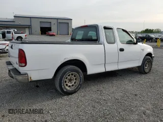 1998 Ford F-150 with VIN 1FTZX17W2WKB25677, listed as a Copart auction lot 54419145 with 319,584 mi miles and Salvage title. Bid and sale history available at DreamBid. Image 3.