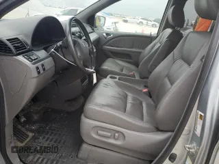 2010 Honda Odyssey EX-L z VIN 5FNRL3H79AB035026, wystawiony jako Copart lot #45910525 z przebiegiem 133 818 mil mil oraz Szkoda całkowita • Salvage title. Historia ofert i sprzedaży dostępna na DreamBid. Obrazek 7.