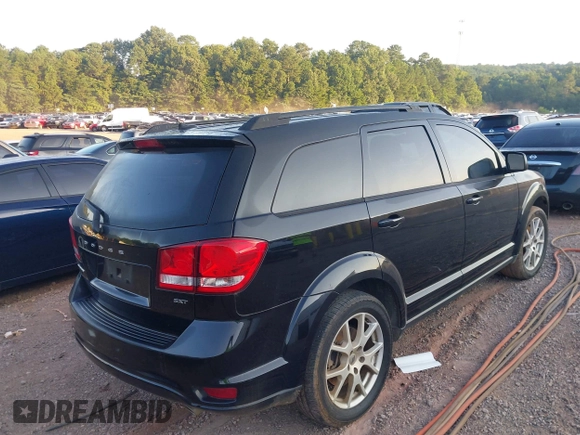 2015 Dodge Journey SXT with VIN 3C4PDCBG7FT556929, listed as a IAAI auction lot 42664149 with 191,980 mi miles and . Bid and sale history available at DreamBid. Image 4.