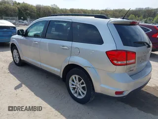 2014 Dodge Journey SXT z VIN 3C4PDDBG8ET155636, wystawiony jako IAAI lot #42215777 z przebiegiem 193 708 mil mil oraz . Historia ofert i sprzedaży dostępna na DreamBid. Obrazek 3.