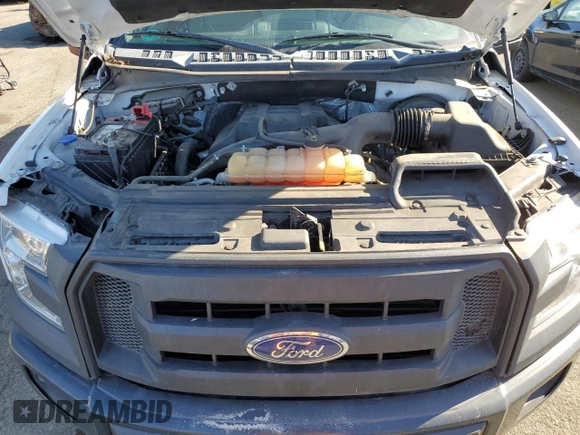 2015 Ford F-150 XL with VIN 1FTMF1CP9FFA40307, listed as a Copart auction lot 80064004 with 70,983 mi miles and Salvage title. Bid and sale history available at DreamBid. Image 11.