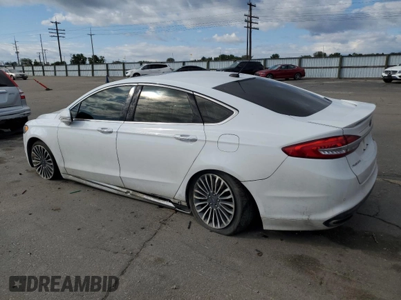 2018 Ford Fusion Titanium with VIN 3FA6P0D94JR247057, listed as a Copart auction lot 56916365 with 101,577 mi miles and Salvage title. Bid and sale history available at DreamBid. Image 2.