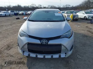 2019 Toyota Corolla L with VIN 2T1BURHE7KC223002, listed as a IAAI auction lot 41371130 with 251,534 mi miles and . Bid and sale history available at carsss.com. Image 13.