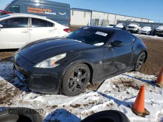 2012 Nissan 370Z z VIN JN1AZ4EH5CM563769, wystawiony jako Copart lot #87545975 z przebiegiem 117 381 mil mil oraz Szkody całkowita. Historia ofert i sprzedaży dostępna na DreamBid. Obrazek 1.