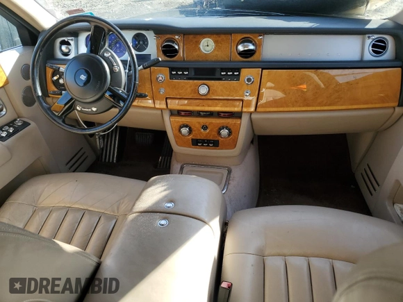 2004 Rolls-Royce Phantom z VIN SCA1S68414UX07249, wystawiony jako Copart lot #88060075 z przebiegiem Nie podano mil oraz Szkody całkowita. Historia ofert i sprzedaży dostępna na DreamBid. Obrazek 8.