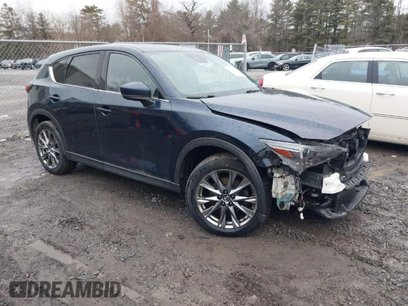 2019 Mazda CX-5 Signature with VIN JM3KFBEY4K0525171, listed as a IAAI auction lot 41706635 with 88,293 mi miles. Bid and sale history available at carsss.com. Image 1.