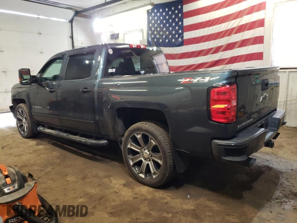 2018 Chevrolet Silverado 1500 LT with VIN 3GCUKREC5JG121283, listed as a Copart auction lot 49836155 with 95,838 mi miles and Salvage Title. Bid and sale history available at DreamBid. Image 2.