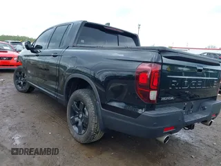 2024 Honda Ridgeline Black Edition with VIN 5FPYK3F86RB030458, listed as a IAAI auction lot 42180255 with 10,513 mi miles and . Bid and sale history available at DreamBid. Image 3.