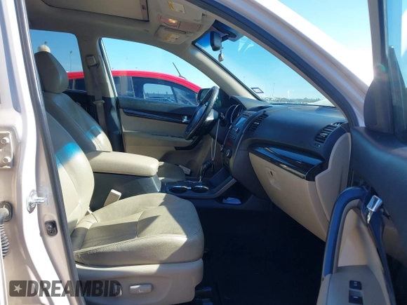 2012 Kia Sorento EX with VIN 5XYKU4A23CG205699, listed as a IAAI auction lot 41384287 with 205,303 mi miles. Bid and sale history available at carsss.com. Image 5.