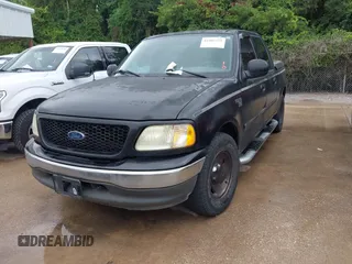 2003 Ford F-150 XLT with VIN 1FTRW07683KC30930, listed as a IAAI auction lot 42482529 with Not provided miles and . Bid and sale history available at DreamBid. Image 2.