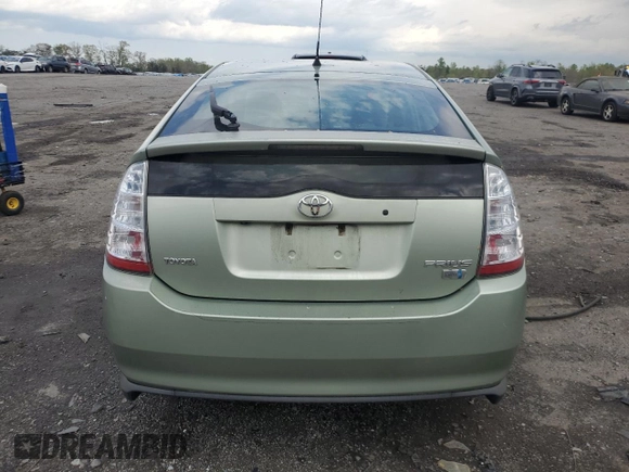2007 Toyota Prius z VIN JTDKB20U677574248, wystawiony jako Copart lot #53359355 z przebiegiem 225 445 mil mil oraz Czysty tytuł • Clean title. Historia ofert i sprzedaży dostępna na DreamBid. Obrazek 6.