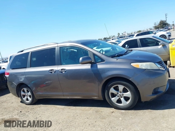 2011 Toyota Sienna LE AAS with VIN 5TDKK3DC0BS055346, listed as a IAAI auction lot 41834715 with 124,847 mi miles. Bid and sale history available at carsss.com. Image 13.