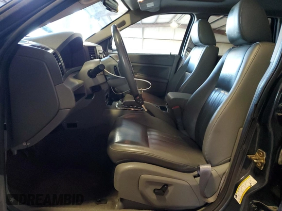 2006 Jeep Grand Cherokee Laredo with VIN 1J4HS48N16C351585, listed as a Copart auction lot 80783644 with 105,684 mi miles and Salvage Title. Bid and sale history available at carsss.com. Image 7.