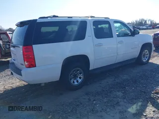 2014 GMC Yukon XL SLT with VIN 1GKS1KE09ER116590, listed as a IAAI auction lot 41459319 with 246,958 mi miles. Bid and sale history available at carsss.com. Image 4.
